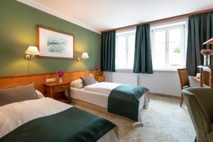 Hotel Gasthof Lercher客房内的一张或多张床位