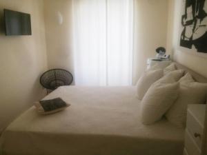 Postel nebo postele na pokoji v ubytování Casa Marianne