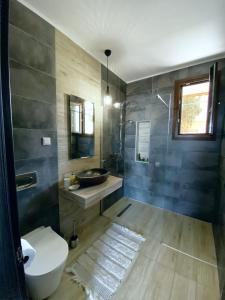 Ванная комната в Casa Del Mar Thassos