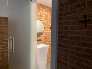 Koupelna v ubytování Manca Loft & SPA