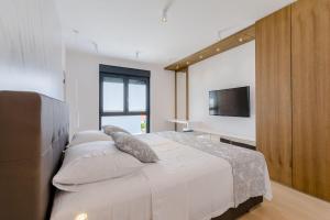Postel nebo postele na pokoji v ubytování Luxury Villa Complex