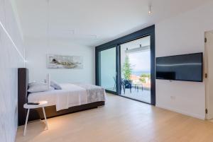Postel nebo postele na pokoji v ubytování Luxury Villa Complex