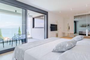 Postel nebo postele na pokoji v ubytování Luxury Villa Complex
