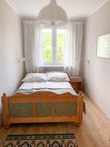 Posteľ alebo postele v izbe v ubytovaní Między górami. Apartament w Cisnej