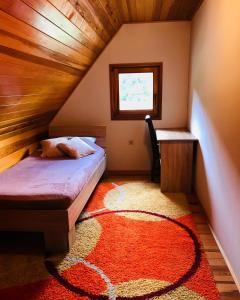 Giường trong phòng chung tại Apartmani d&s
