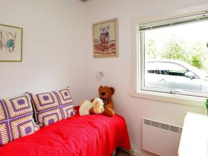 Postel nebo postele na pokoji v ubytování Holiday home Hals IX