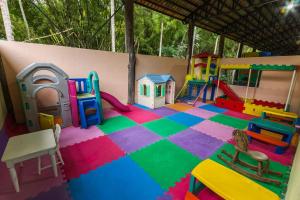 a play room with many different types of play equipment at Resort Fazenda 3 Pinheiros in Engenheiro Passos