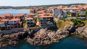 an aerial view of a town on a rocky coast at Sozopol Apartment with Sea View in Sozopol