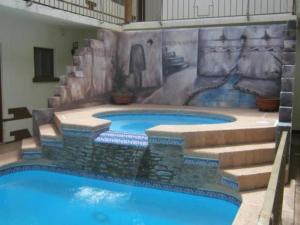 Bazén v ubytování Hotel Paquime nebo v jeho okolí