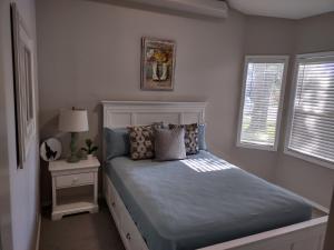 Ένα ή περισσότερα κρεβάτια σε δωμάτιο στο Meridian BnB ID - Pristine 4BR 2BA Spacious Home In The Heart Of Meridian Near Boise