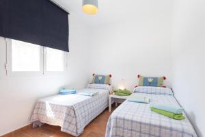 Postel nebo postele na pokoji v ubytování Casas Lionel