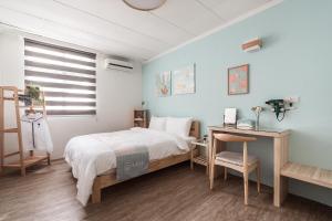 Voodi või voodid majutusasutuse Hibnb Guesthouse toas