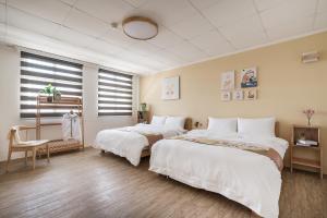Voodi või voodid majutusasutuse Hibnb Guesthouse toas