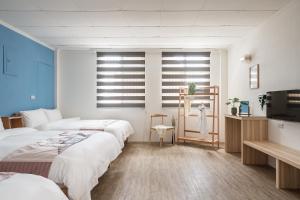 Voodi või voodid majutusasutuse Hibnb Guesthouse toas