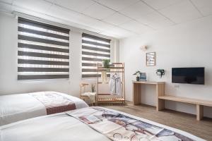 Voodi või voodid majutusasutuse Hibnb Guesthouse toas