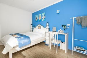 Voodi või voodid majutusasutuse Hibnb Guesthouse toas