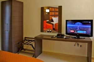 TV a/nebo společenská místnost v ubytování Chasapis Luxury Studios & Apartments