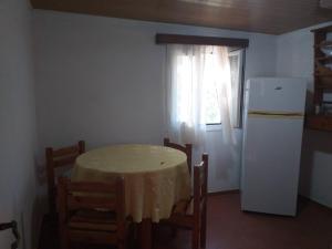 A kitchen or kitchenette at Ammos Apartments