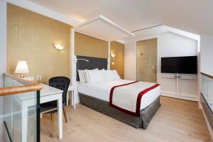 Postel nebo postele na pokoji v ubytování Áurea Ana Palace by Eurostars Hotel Company