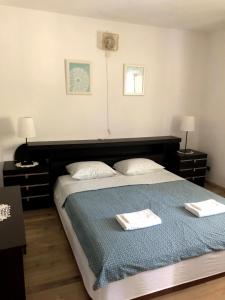 Posteľ alebo postele v izbe v ubytovaní Armstrong Apartments