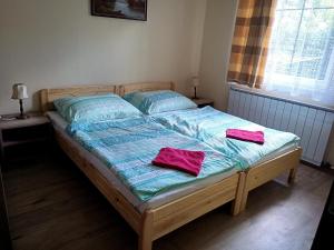 Postel nebo postele na pokoji v ubytování Galamb Villa