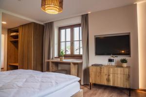 Voodi või voodid majutusasutuse Bergrose Hideaway toas