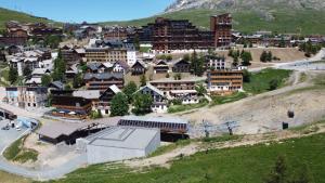 an aerial view of a small town in a mountain at Hotel Le Refuge in L'Alpe-d'Huez