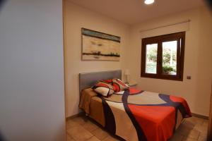 Giường trong phòng chung tại Magica CostaBravaSi +27 ảnh