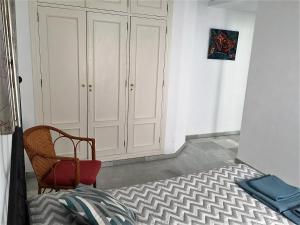 Postel nebo postele na pokoji v ubytování Luminoso y amplio apartamento en el centro histórico de Sevilla