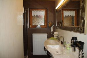 Koupelna v ubytování Appartements Familie Eberharter + 13 fotografií