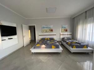 Fotografie z fotogalerie ubytování MEGA Apartments v destinaci Fushë-Draç