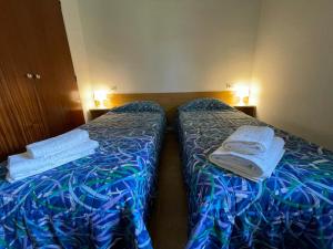 Säng eller sängar i ett rum på Apartament a La Molina, grans vistes, llar de foc