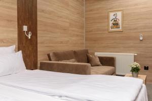 Postel nebo postele na pokoji v ubytování Holiday Park Zagyland