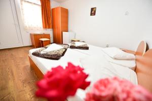 Postel nebo postele na pokoji v ubytování Vila Maya