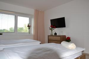 Posteľ alebo postele v izbe v ubytovaní Apartmany u Polanských Lednice