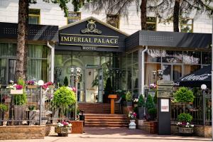 an internal palace store with a sign in front of it at Imperial Palace Hotel in Minsk