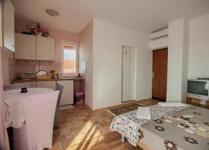Kuchyň nebo kuchyňský kout v ubytování Apartmani More Krk