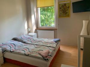 Posteľ alebo postele v izbe v ubytovaní Apartamenty pokoje "MARIA"