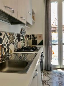 Kuchyň nebo kuchyňský kout v ubytování Casa Colore Loft