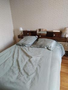 Postel nebo postele na pokoji v ubytování Gîte Moishan