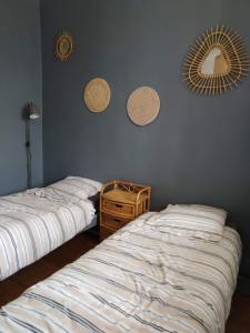 Postel nebo postele na pokoji v ubytování Gîte Moishan