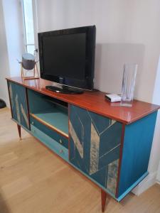 TV a/nebo společenská místnost v ubytování Gîte Moishan