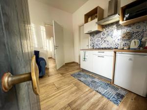 Kuchyňa alebo kuchynka v ubytovaní Baglio Reale Apartments