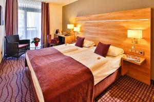 Postel nebo postele na pokoji v ubytování NP Hotel Wallis + 37 fotografií