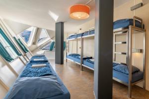 Кровать или кровати в номере Stayokay Hostel Rotterdam