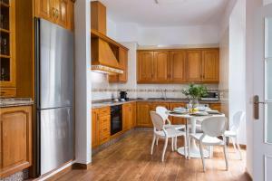 Køkken eller tekøkken på Genteel Home Alhóndiga Sevilla