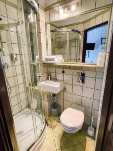 Koupelna v ubytování Karczma Rzym + 37 fotografií