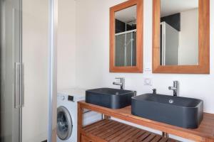 Ванна кімната в Maison a La Turballe