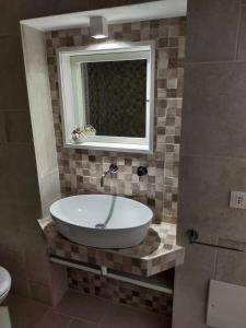 A bathroom at Dimora MareLuna