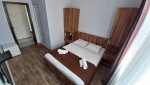 Letto o letti in una camera di Balu